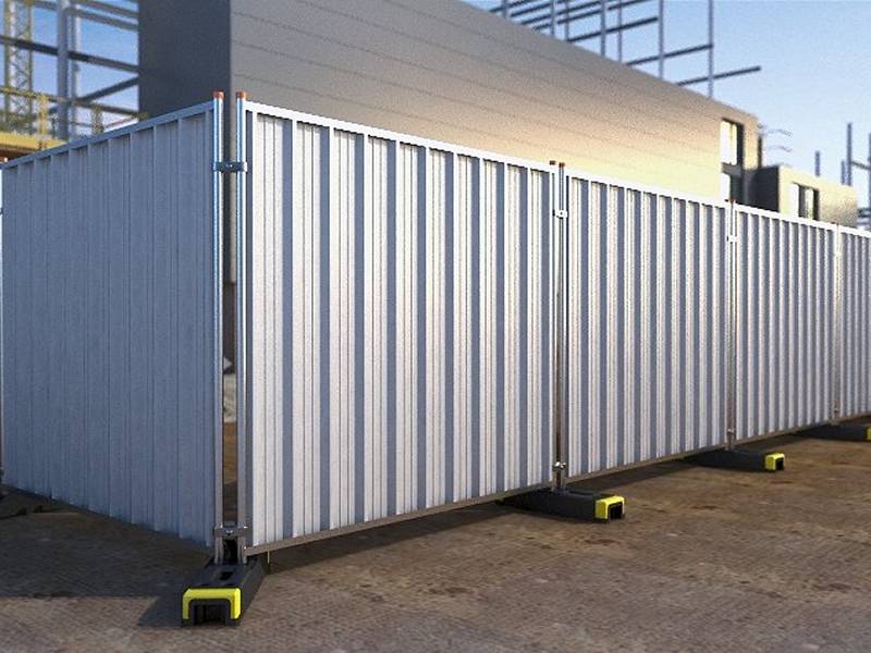 Hoarding panel system with galvanized frame and rubber feet on ground.