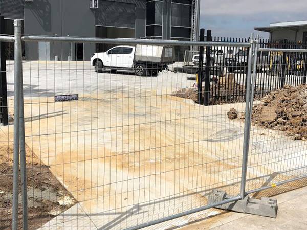 Australia temporary fence with gate is installed for worksite security.
