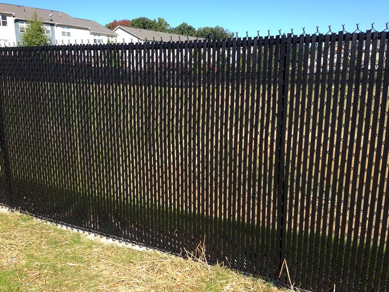 This is a chain link fence with black slats.
