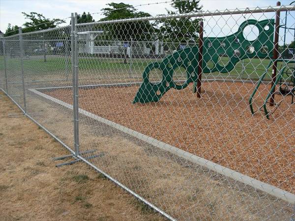 Temporary chain link fence installed for perimeter protection of the recess park.